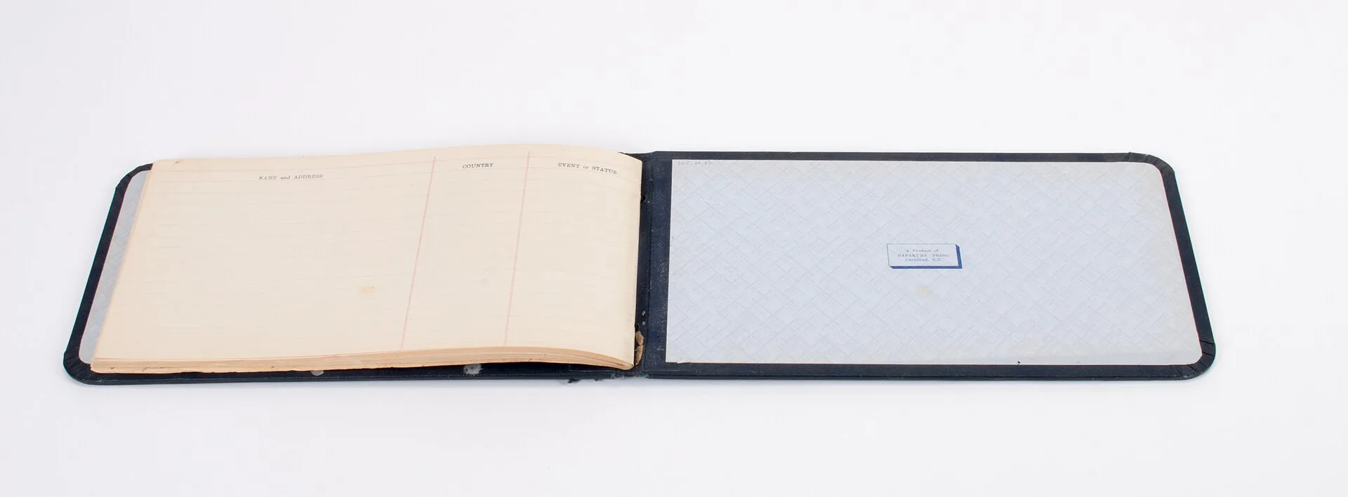 Autograph album, Austin J. Gittos - 1950 British Empire Games (BEG) Auckland rectangular navy autograph album with rounded edges and (leatherette) cover; cover printed with "Autographs - Competitors and Officials British Empire Games" and kiwi and NZ silver fern icons, silver ink; title page printed